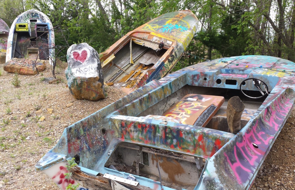 Lessman encourages patrons to bring spray paint and put their name or a message on the boats. His goal is to exceed Cadillac Ranch in Texas, where the paint is said to be two inches thick.