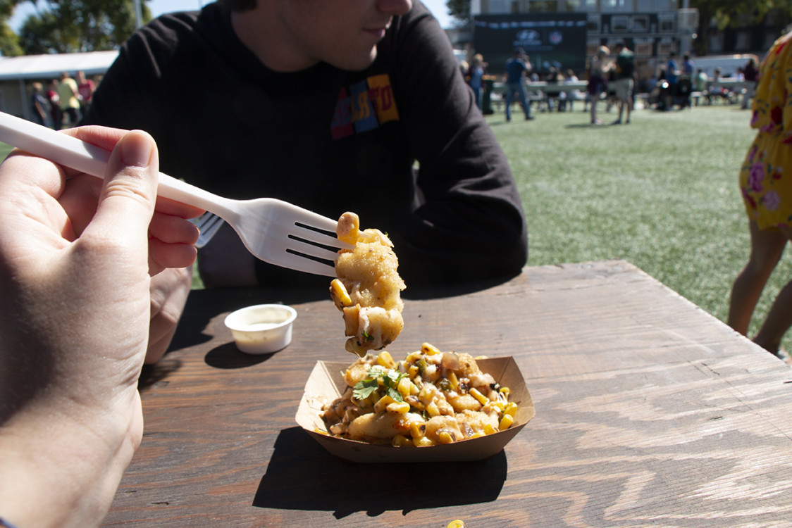 Elote curds on a fork