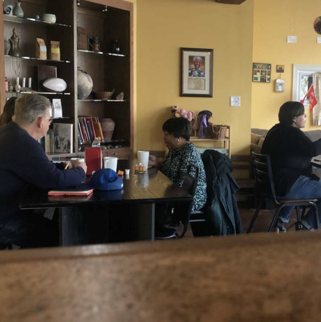 image of people enjoying food at Equal Minded Cafe