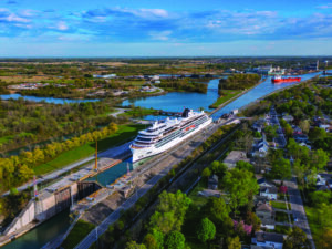 An aerial view of a cruise ship sitting in the Welland Canal in Canada.