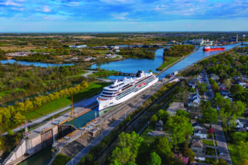 An aerial view of a cruise ship sitting in the Welland Canal in Canada.